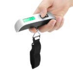 Digital luggage scale hanging baggage scale with LCD display 50kg capacity on white background
