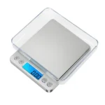 Digital gram kitchen scale with 3kg capacity, 0.1g precision, LCD display, tare function, and silver finish.