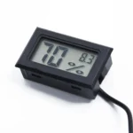 Black digital LCD hygrometer thermometer with a wired external probe, displaying indoor temperature and humidity for home, office, or incubator use.